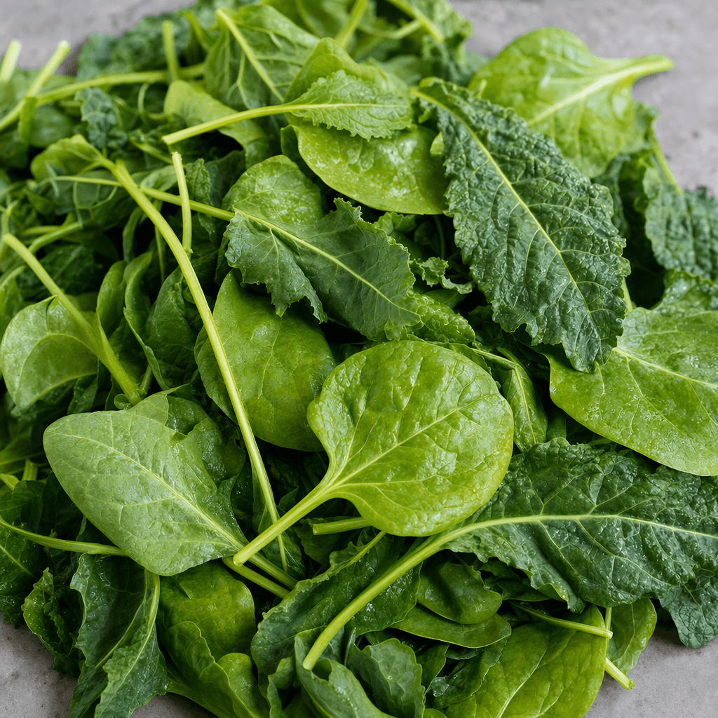 A loose pile of leafy green vegetables with overlapping leaves in several shades of green, their veined surfaces and slender stems clearly visible.